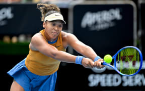 Naomi Osaka of Japan plays a shot against Julia Grabher of Austria.