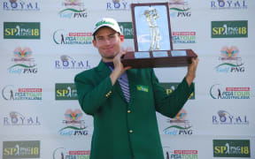 Daniel Gale celebrates winning the PNG Open.