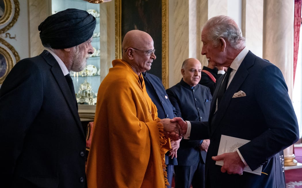 King Charles III meets with faith leaders during a reception at Buckingham Palace in London on 16 September, 2022, following the death of Queen Elizabeth II on 8 September.