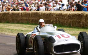 Britain's Stirling Moss in a 1954 Mercedes Benz W196 racing car.