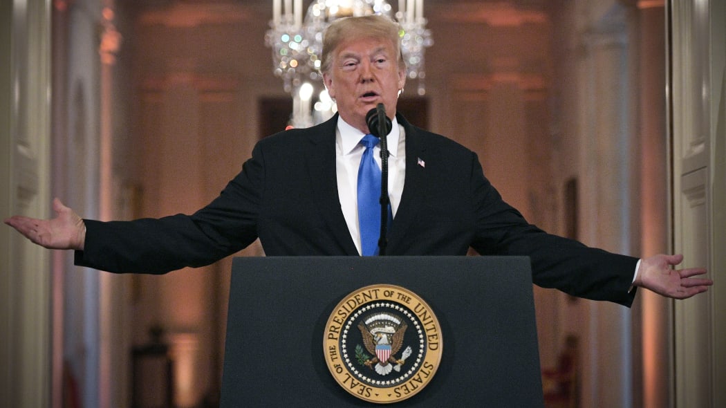 US President Donald Trump speaks during a post-election press conference in the East Room of the White House in Washington, DC on November 7, 2018. (Photo by Jim WATSON / AFP)