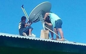 A satellite dish is installed as part of the WIFI project