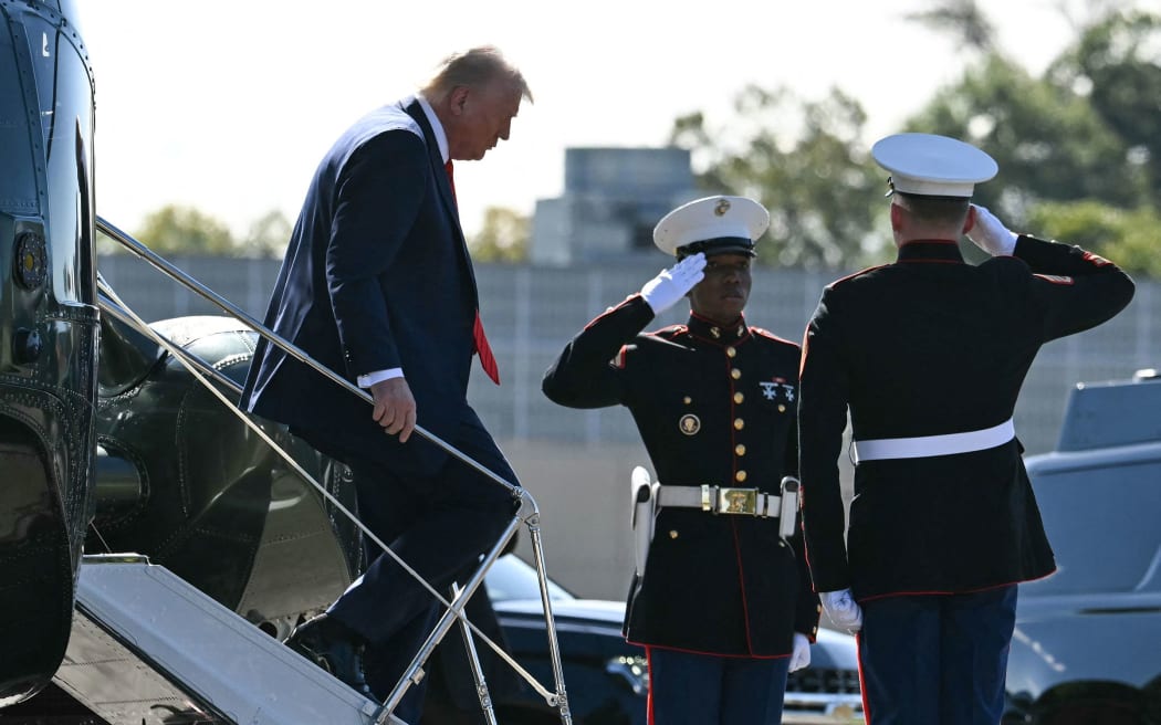 President Donald Trump steps off Marine One as he arrives to Walter Reed National Military Medical Center to receive a medical checkup in Bethesda, Maryland, on October 10, 2025.