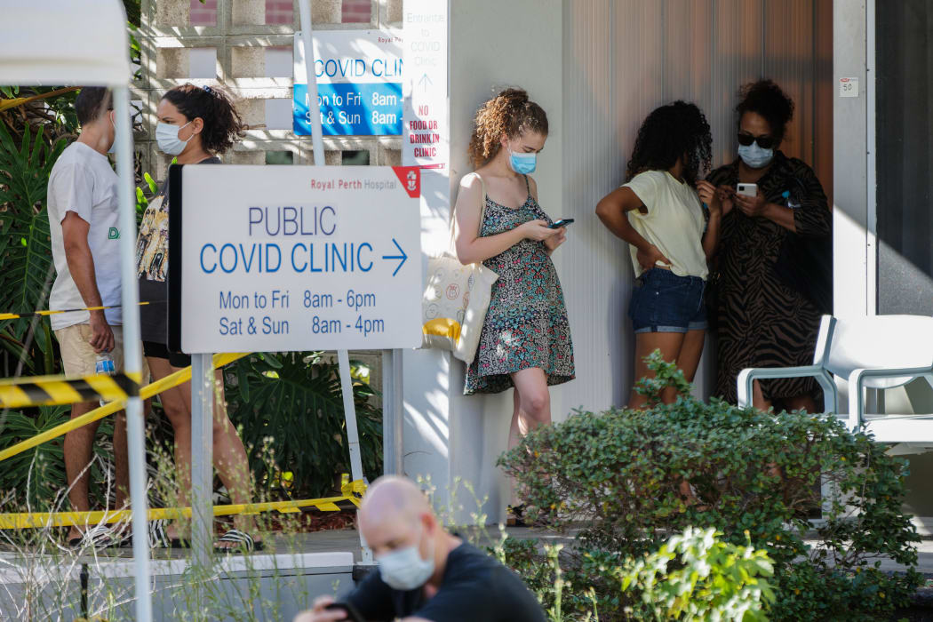People wait in line to be tested for Covid-19 at Royal Perth Hospital in Perth on 31 January.