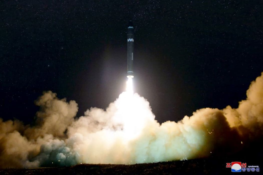 A photo released by North Korea's official Korean Central News Agency (KCNA) shows launching of the Hwasong-15 missile.