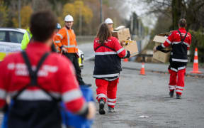 NZ Rescue passing supplies over Ashburton bridge