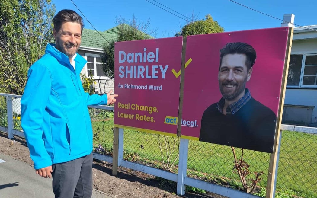 Tasman's ACT Local candidates Daniel Shirley (pictured) and Dave Ross cut their campaign signs in half after they were found to be in breach of Tasman's rules for election signage size in urban areas.