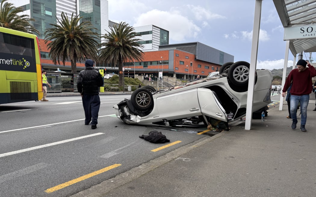 A Toyota Prius on its roof after a crash with a VW Golf outside Wellington Hospital.