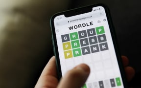 Wordle game displayed on a phone screen is seen in this illustration photo taken in Krakow, Poland on January 23, 2022.