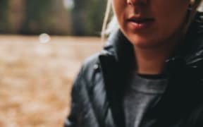 woman holding cup of coffee