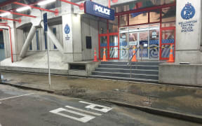 Sewage leaks onto the road outside the Police Station in central Wellington.