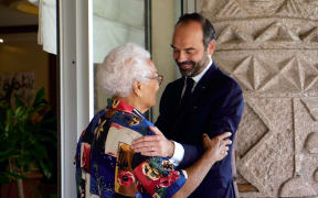 French Prime Minister Edouard Philippe (R) greets Marie-Claude Tjibaou, widow of the historical independence leader Jean-Marie Tjibaou at the French High Commission on November 5, 2018 in Noumea, New Caledonia.