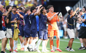 Players from Auckland City FC celebrate after their FIFA Club World Cup 2025 game against CA Boca Juniors.