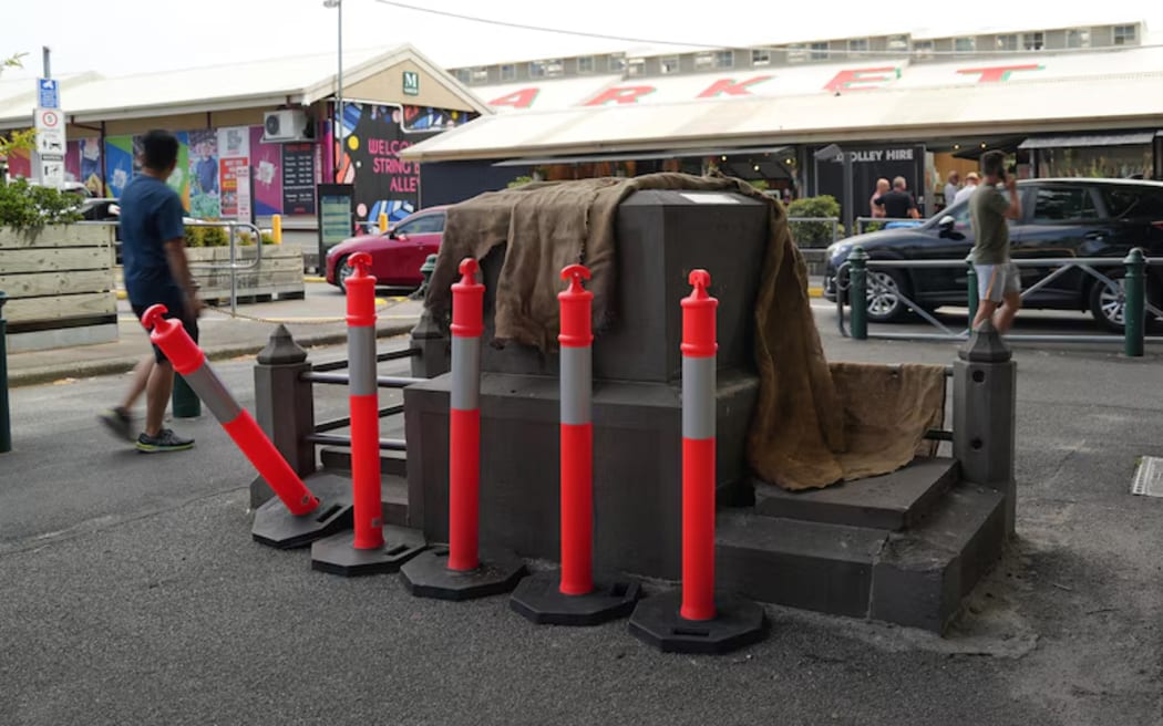 The John Batman memorial at the Queen Victoria Market was sawn in half.