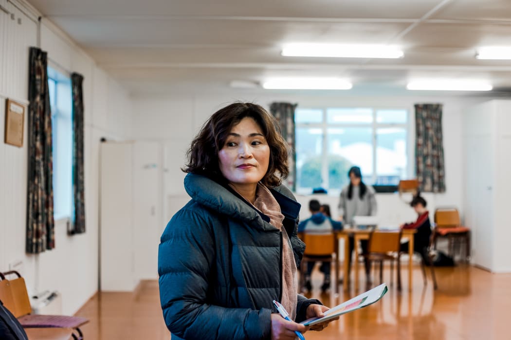Sue Kim doing principal duties for the Korean Language School in Dunedin.
