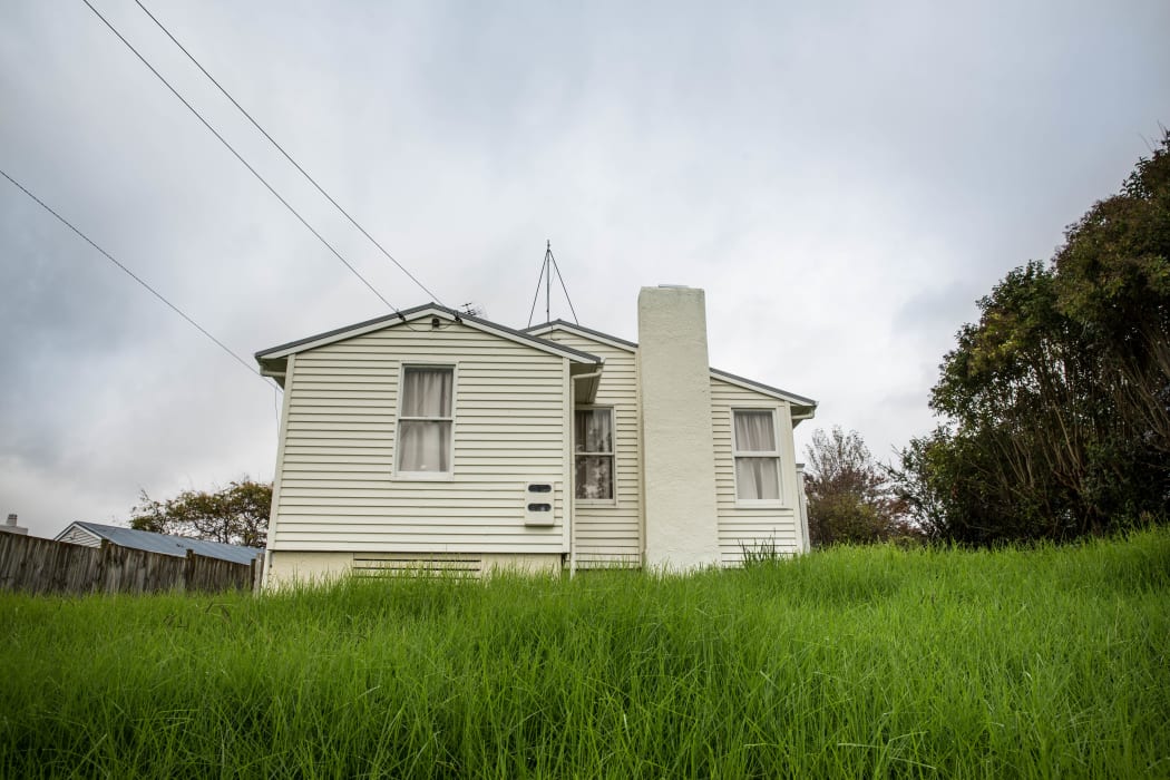 An empty state house with over grown lawns in Glen Innes that has been empty for 3 months