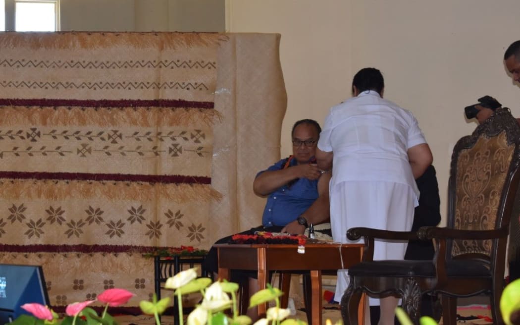 Prime Minister of Tonga, Pohiva Tu’i’onetoa get his Covid-19 vaccine.