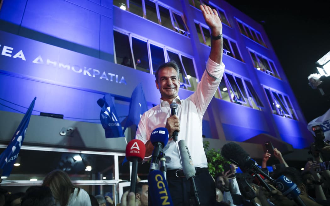 New Democracy Party leader Kyriakos Mitsotakis, celebrates with Party fans after winning the Greek elections, on June 25, 2023