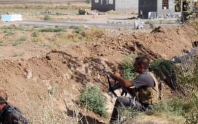 A Iraqi Turkmen Shiite fighter, on 4 August 4, 2014 in Amerli. Amerli has been besieged by Islamic State for two months.