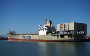 OAKLAND - OCTOBER 12: Matson shipping boat is unloaded by cranes in Oakland Harbor. The fourth busiest container port in the country, it's a major economic engine in the San Francisco Bay Area.
