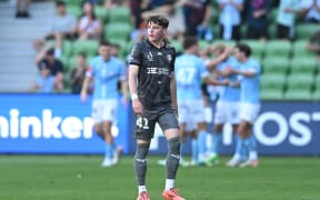 Nathan Walker of the Phoenix reacts after Nathaniel Atkinson of Melbourne City scores a goal.