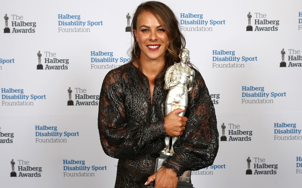 Lisa Carrington cradles her Supreme Halberg Award.