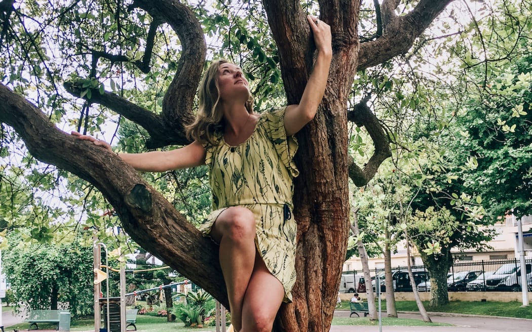 Kate in an ancient feijoa in Square Mistral in Cannes, France.