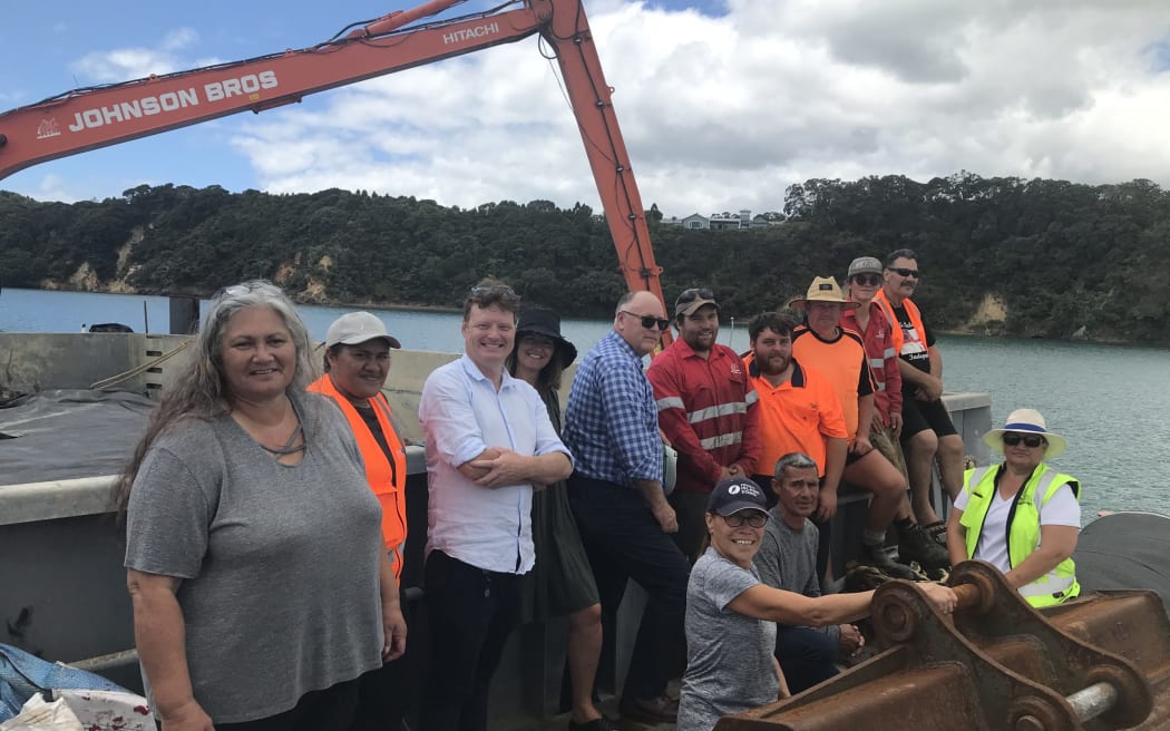 Leaders in the fight against Bay of Islands' now nine-month old battle against the invasive caulerpa on New Zealand's first mechanical caulerpa suction dredge in Omākiwi Cove.
