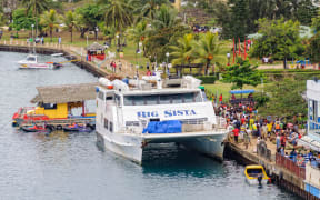 Big Sista, a 33m passenger vessel, has arrived on its weekly run from Luganville Santo to the harbour in front of the main market of Port Vila - Efate Island, Vanuatu, 21 September 2012