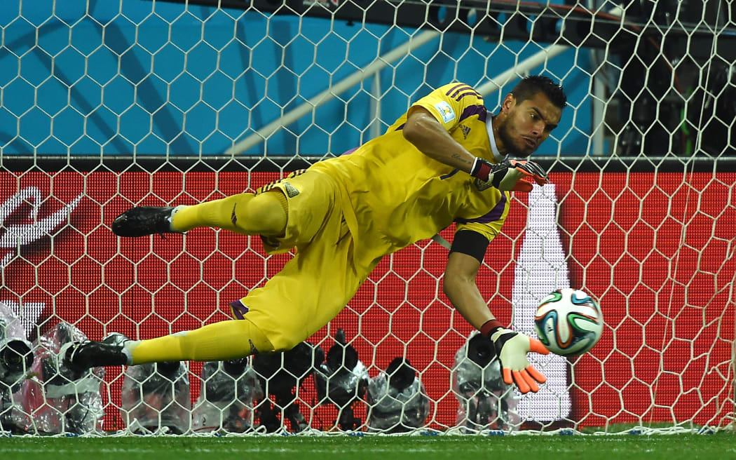 Argentina's goalkeeper Sergio Romero saved 2 Dutch spot kicks.