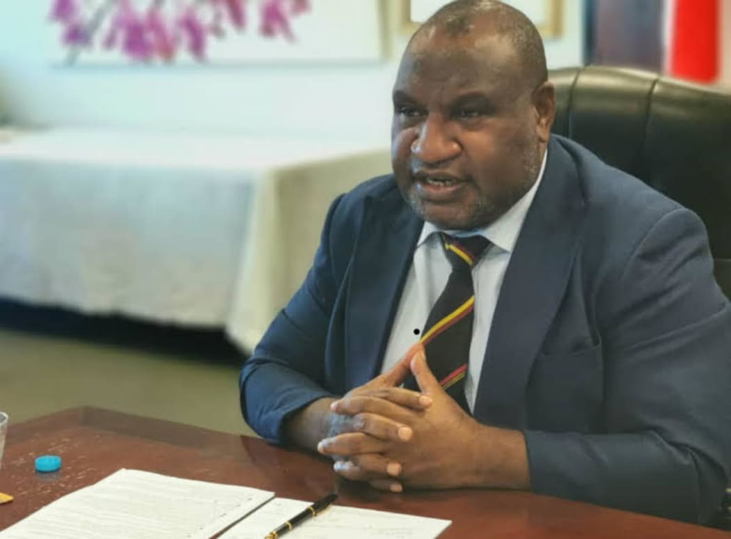 PNG Prime Minister James Marape speaks to his Japanese counterpart Yoshide Suga during a virtual online summit, 29 June 2021.