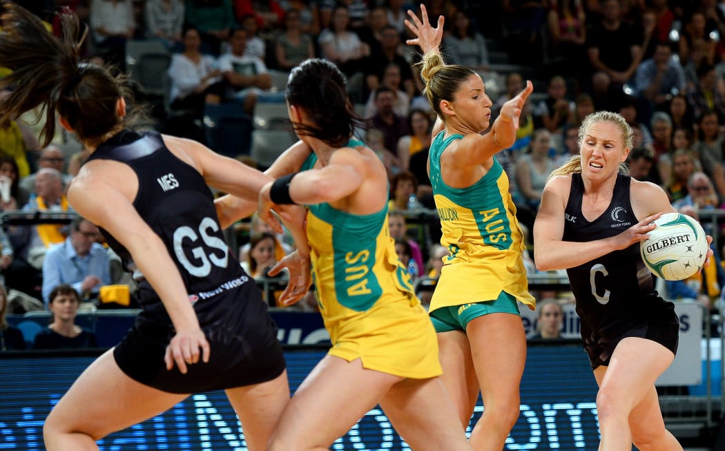 The New Zealand centre Laura Langman heads into traffic.