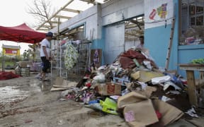 Shop owners are saving what they can but most of their merchandise has been lost.