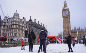 Heavy snowfall hit parts of Britain, including London, on 12 December, 2022. The city is covered in snow, causing travel disruptions in some London airports and underground network. (Photo by Alexander Mak/NurPhoto) (Photo by Alexander Mak / NurPhoto / NurPhoto via AFP)