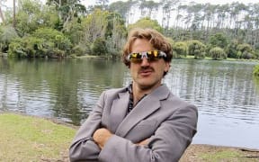 Louis Sammons plans to run the Tongariro Crossing in two hours in a suit, to raise money for KidsCan.