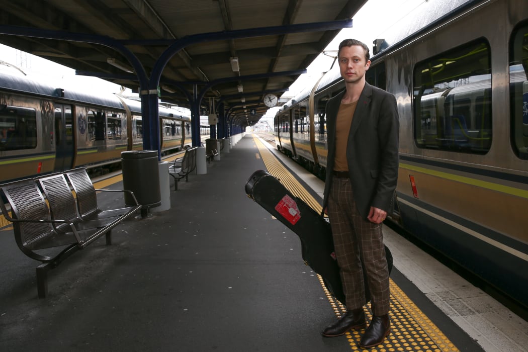 Anthonie Tonnon waiting for the train on his Rail Land tour