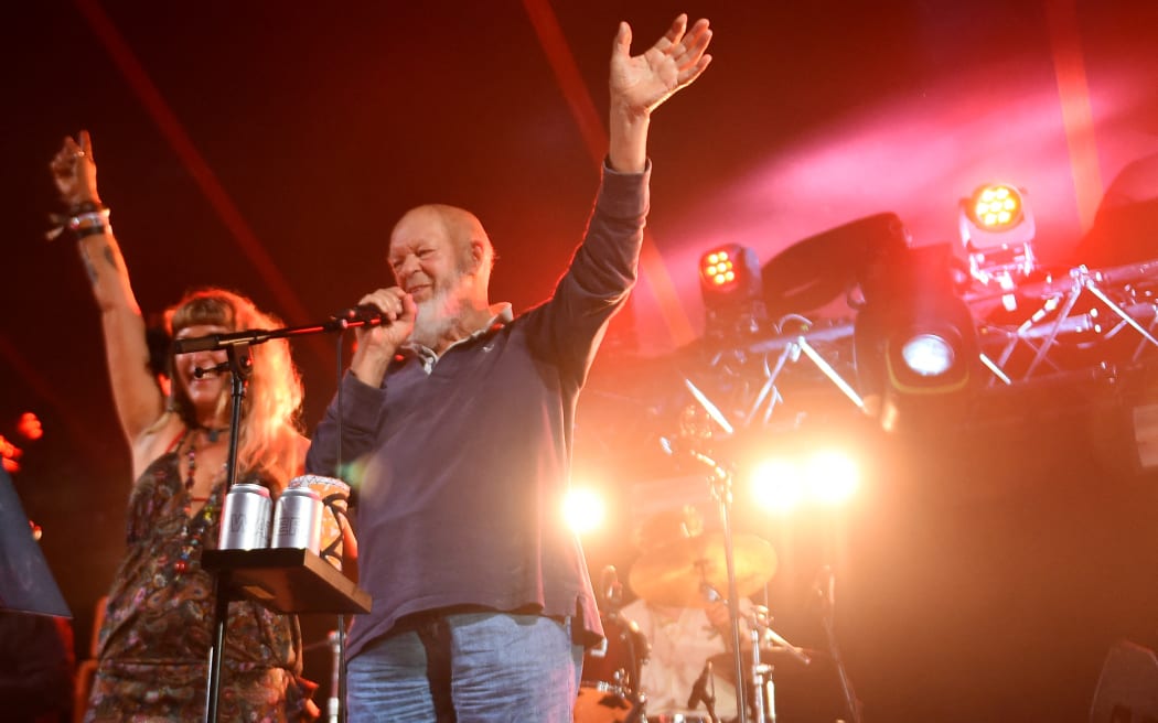 Glastonbury host Michael Eavis performs with his band at the Glastonbury festival near the village of Pilton in Somerset, south-west England, on June 23, 2022. More than 200,000 music fans descend on the English countryside this week as Glastonbury Festival returns after a three-year hiatus. The coronavirus pandemic forced organisers to cancel the last two years' events, and those going this year face an arduous journey battling three days of major rail strikes across the country. (Photo by ANDY BUCHANAN / AFP)