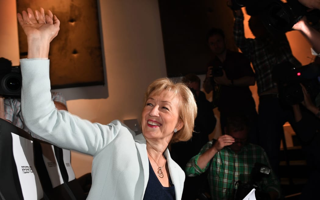 Andrea Leadsom waves to supporters before delivering a leadership rally speech in central London on July 7, 2016.