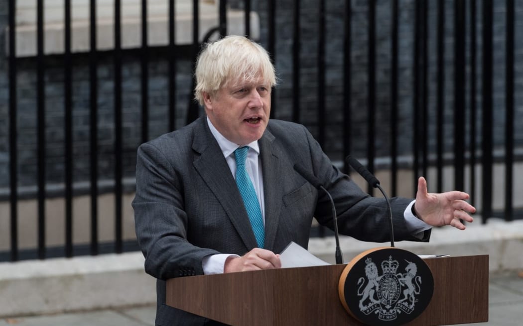 Outgoing British Prime Minister Boris Johnson gives a final speech outside 10 Downing Street.
