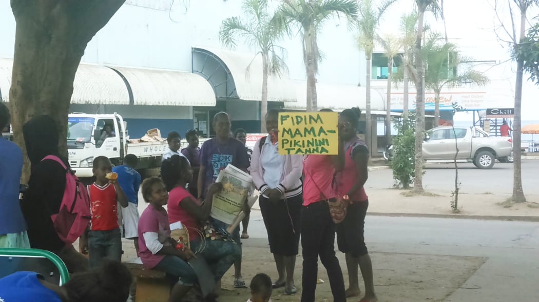 Young women gathered at Port Vila, Vanuatu to collect donations for families struggling to find enough food. Sep 2015