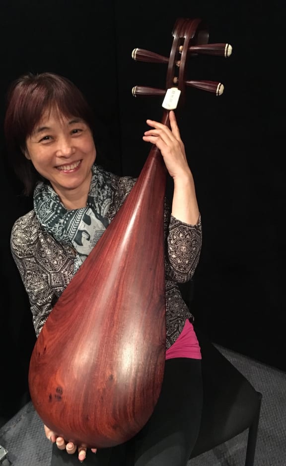 Wu Man and her pipa with a redwood belly