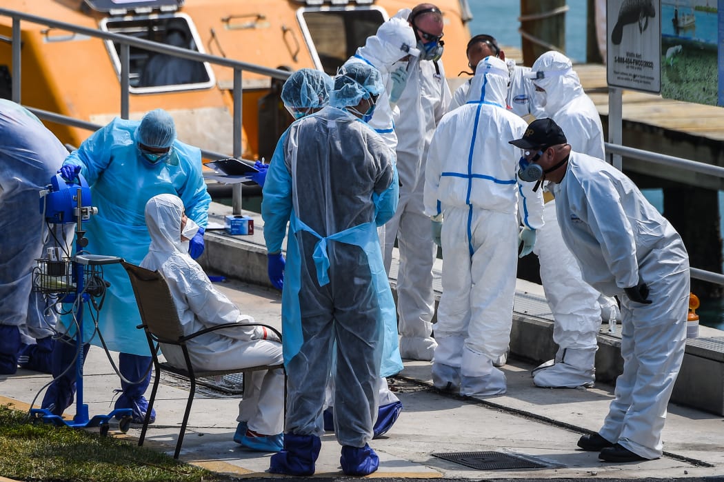 Emergency medical workers evacuate sick crew members with flu-like symptoms from cruise ships in Miami Requests were made by Costa Magica and Costa Favolosa for life-critical care ashore for multiple crew members presenting with respiratory symptoms consistent with pneumonia and bronchitis.