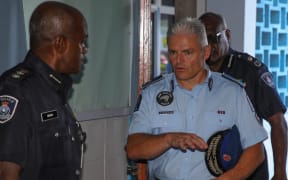 Police Commissioner Richard Chambers, right, at the Fiji Police Force headquarters in Suva. 2 May 2025