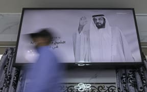 A local channel in the United Arab Emirates displays a portrait of president Sheikh Khalifa bin Zayed Al-Nahyan, during state mourning in Abu Dhabi, on Friday.