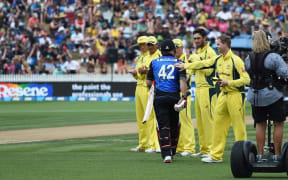 Australian players form a guard of honour for retiring Black Caps captain Brendon McCullum in his final ODI, Seddon Park, Hamilton, New Zealand. Monday 8 February 2016. Copyright photo: Andrew Cornaga / www.photosport.nz