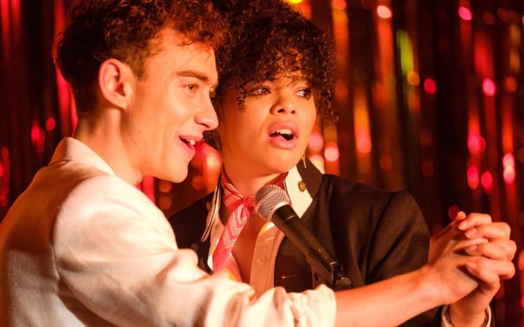 It's a Sin - Olly Alexander as "Ritchie" and    Lydia West as "Jill Baxter"