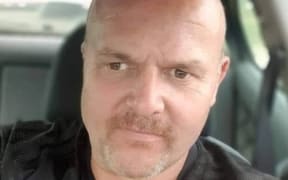 A selfie of missing man John Mills in a car.