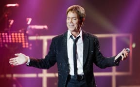 British singer Cliff Richard performs on stage during the first show of his European tour 'Still Reelin' And A-Rockin' at the o2-Arena concert venue in Hamburg, Germany, 13 May 2014.