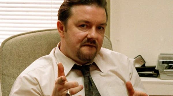 Ricky Gervais as office manager David Brent in the BBC TV series The Office.