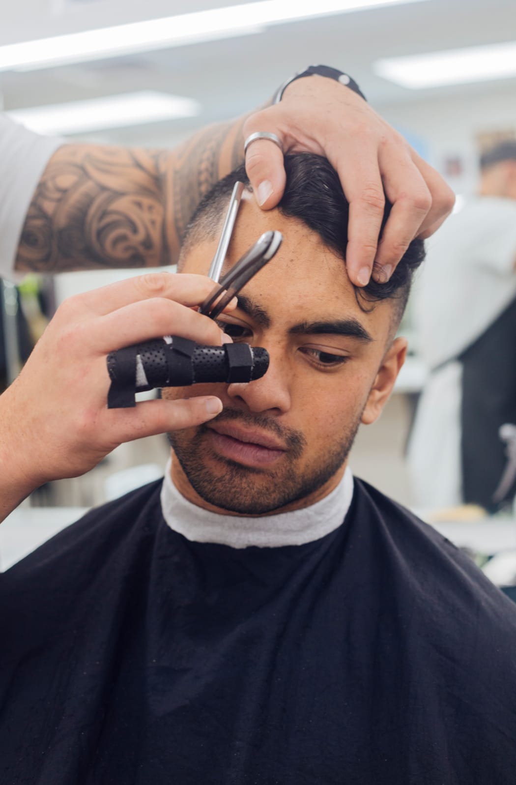 Daniel giving a trim.